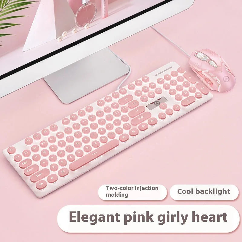Punk style luminous keyboard in mint green with white backlit keys on a desk.