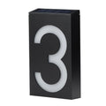 White solar-powered outdoor house number light with visible solar panel and LEDs.
