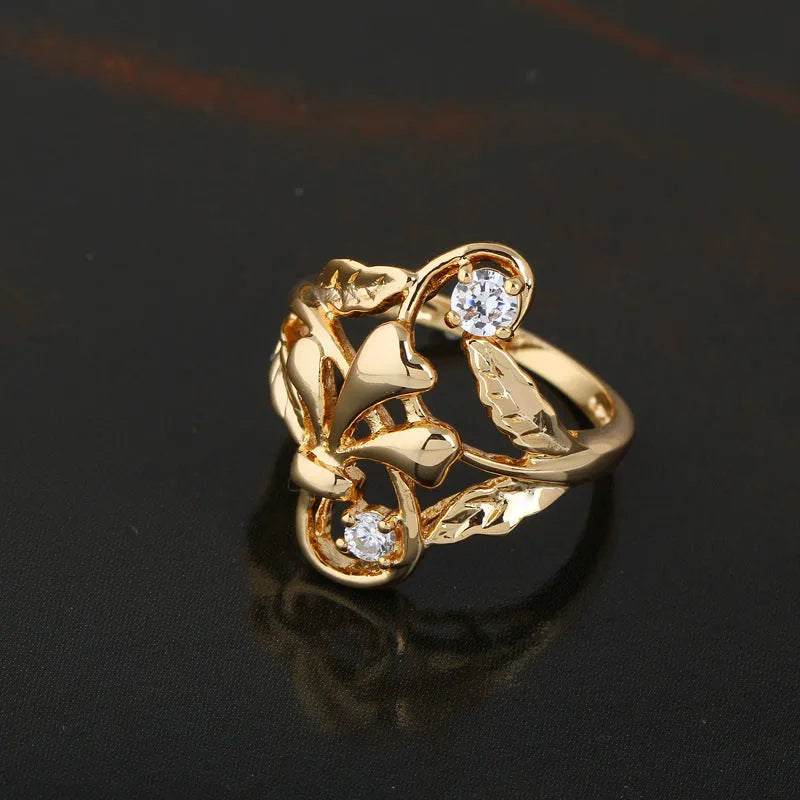 Gold and white zircon irregular leaf ring with copper band, geometric women's design in sizes 5.25 to 9