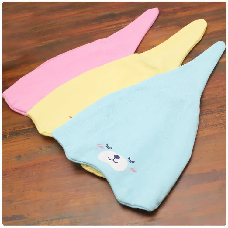 Baby soft cotton sleeping cap with cartoon bear pattern in blue, on a white background