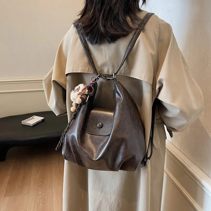Women's textured PU leather commuter shoulder bag with horizontal design and single strap