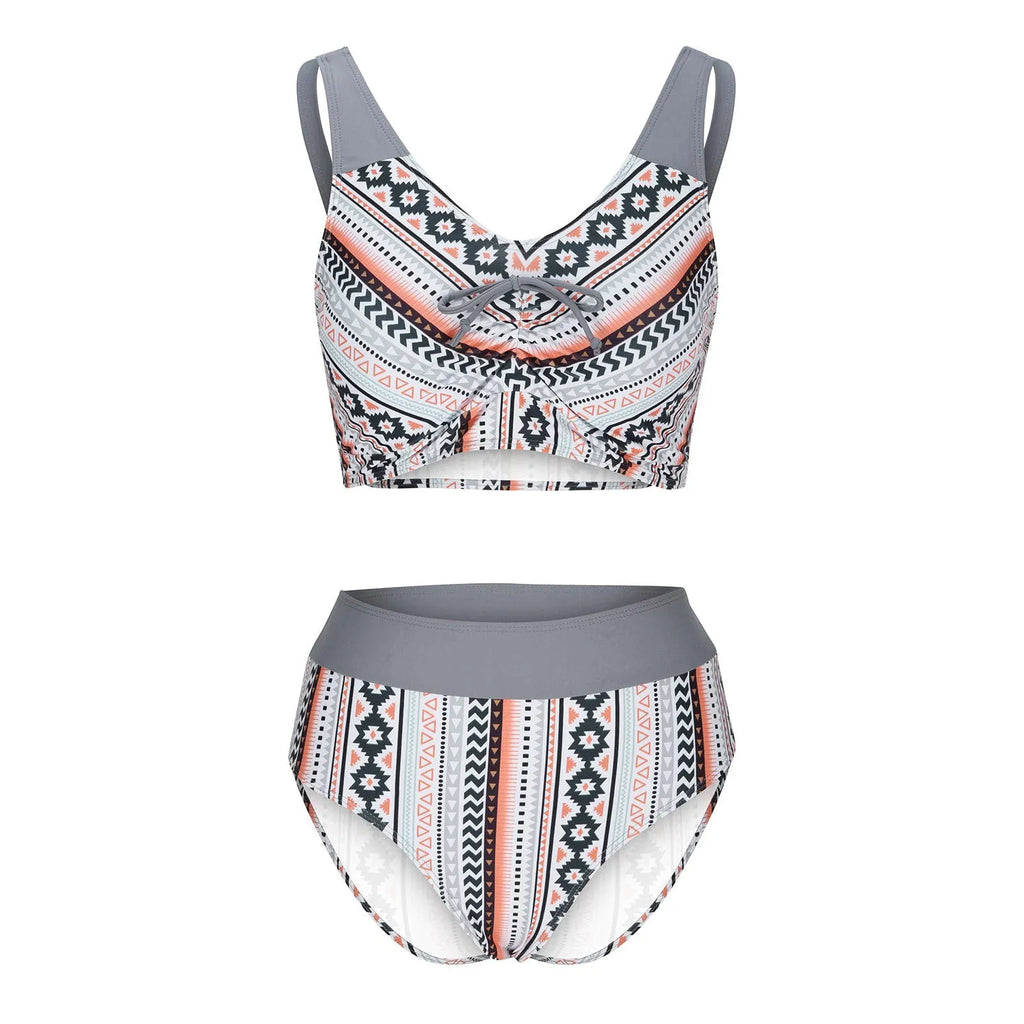Blue women's one-piece swimsuit with cross-strap back, shown on a mannequin.