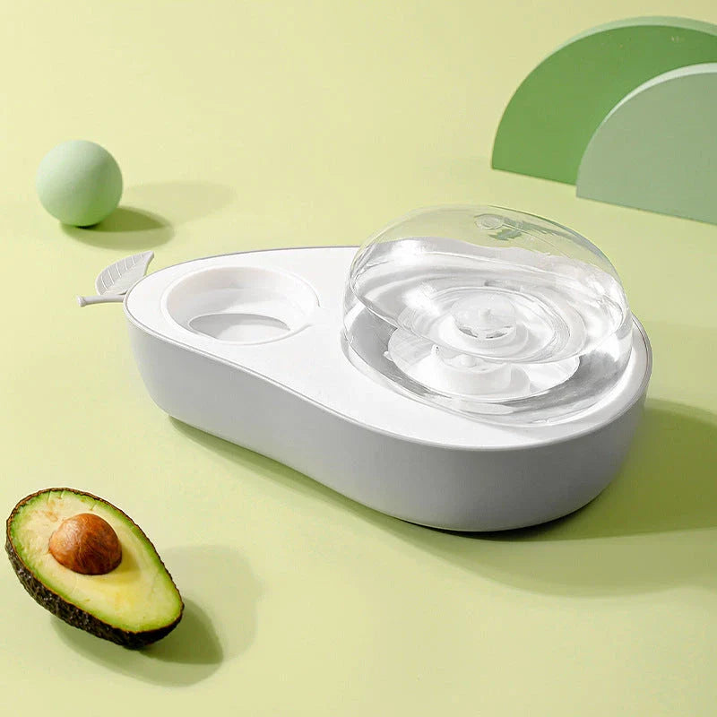 Avocado-shaped automatic pet food and water dispenser for cats and dogs with slow-feed feature and large water capacity