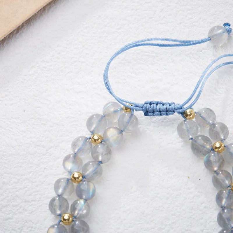 Grey moonstone woven bracelet with butterfly knots and geometric retro design