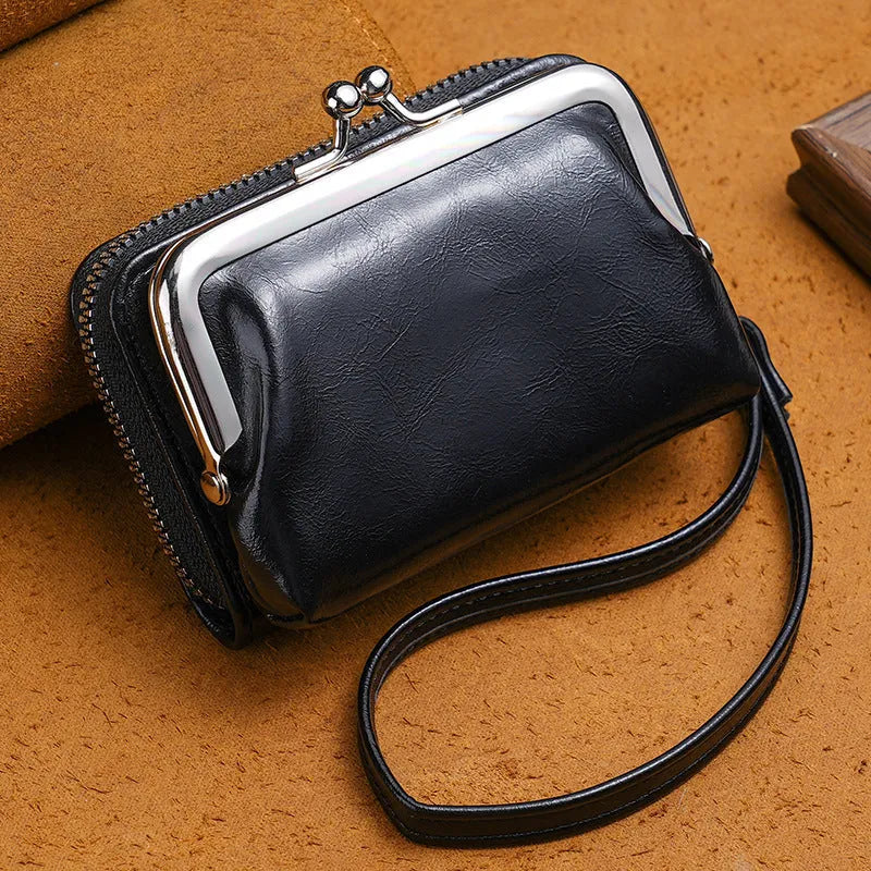 Ladies' buckle coin purse in multiple colours showing metal clip and zippered compartment