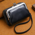 Ladies' buckle coin purse in multiple colours showing metal clip and zippered compartment
