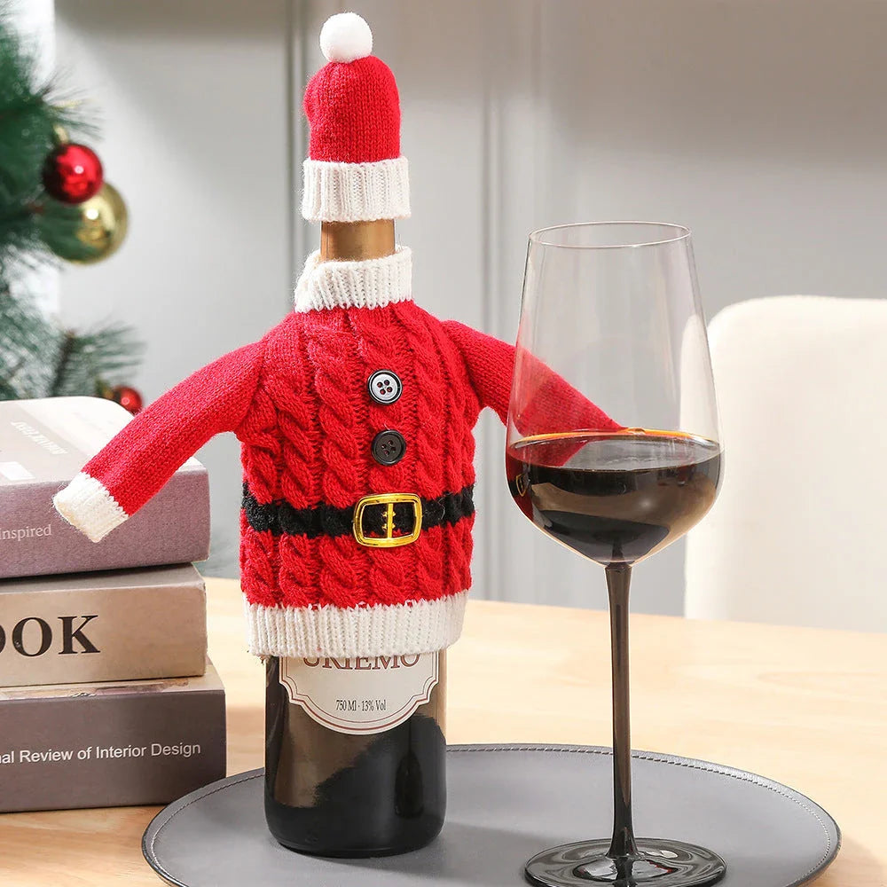 Festive knitted wine bottle covers in red and green stripes and red belt designs, perfect for Christmas and holiday decor