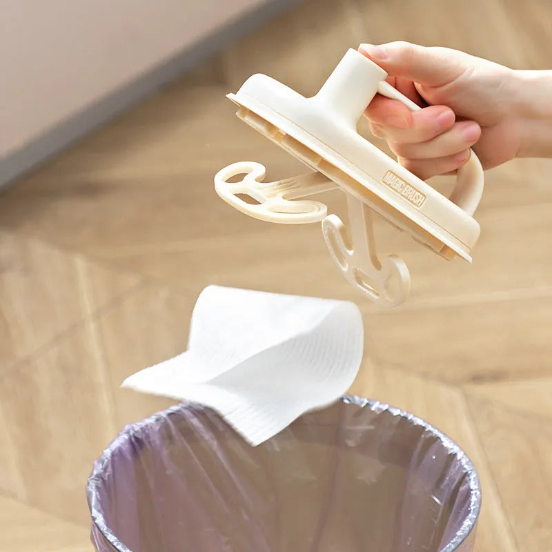 Magic Brush disposable dusting tool with plastic handle and white non-woven rags for cleaning
