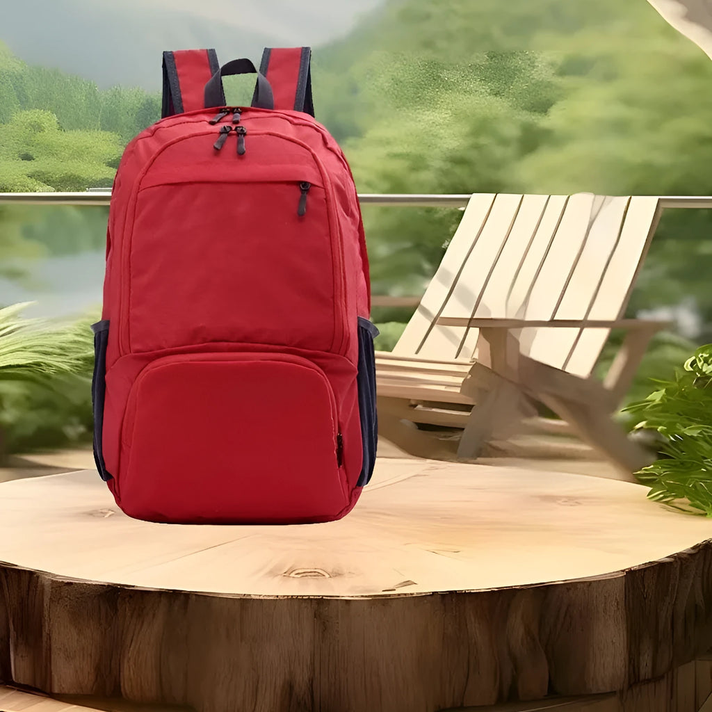 A 26-inch waterproof Oxford cloth backpack in a solid colour, shown folded and unfolded.