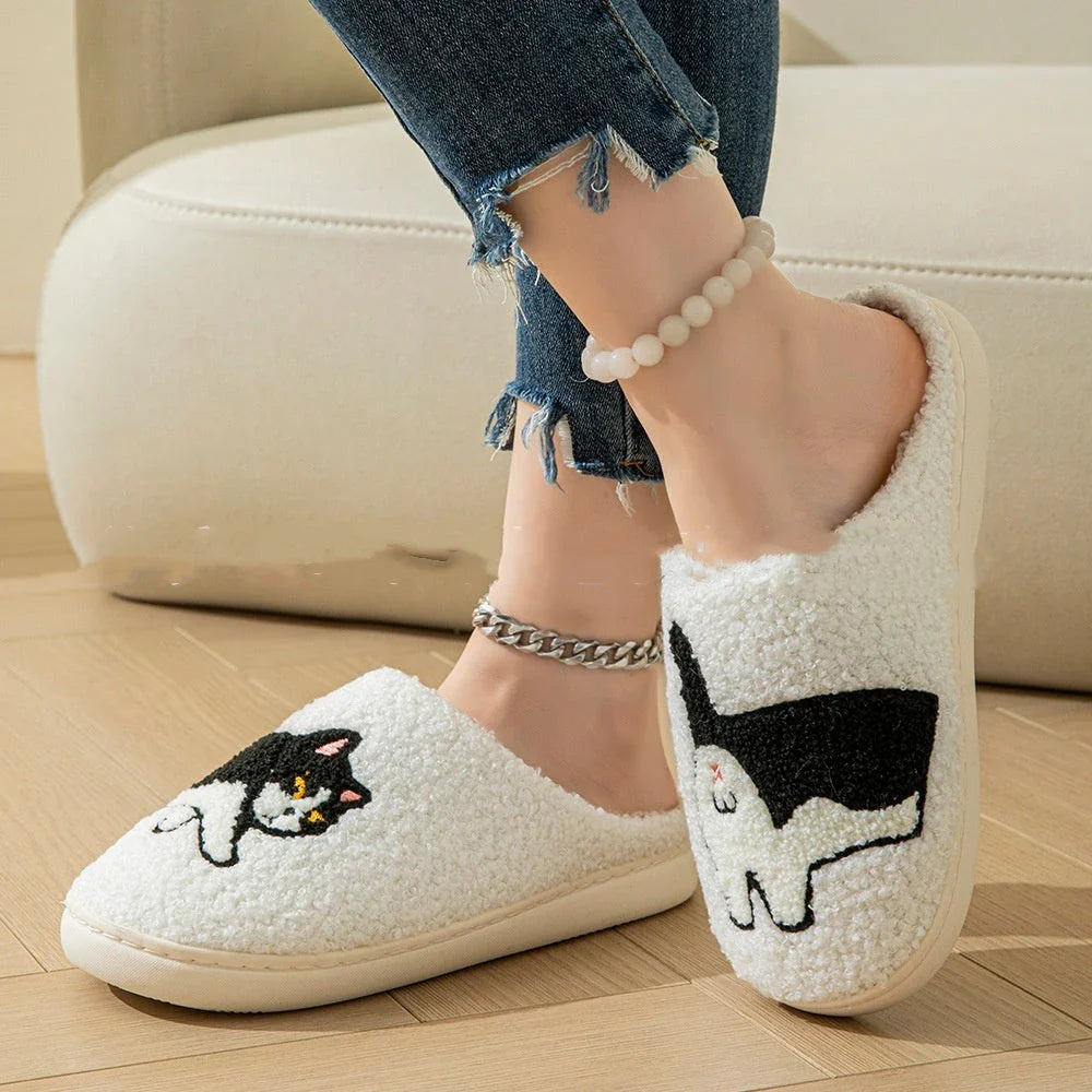 Cozy cartoon-themed slippers with soft, fuzzy interior and non-slip sole for comfortable indoor and outdoor wear