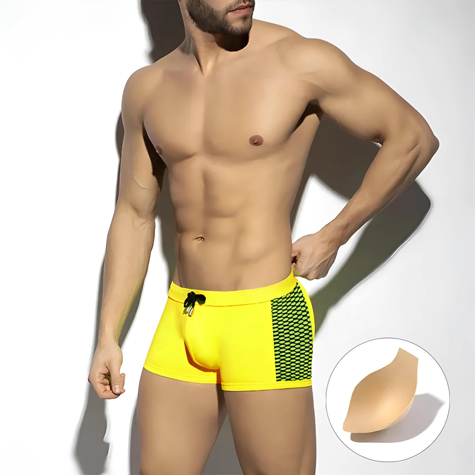 Polka dot print swimming boxers in quick-dry nylon shown in yellow, black, and dark blue colour options.