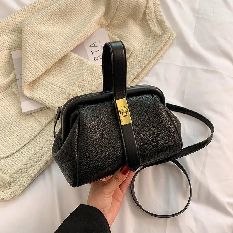 PU leather shoulder bag in cross-square shape with visible sewing line detail, available in four colours