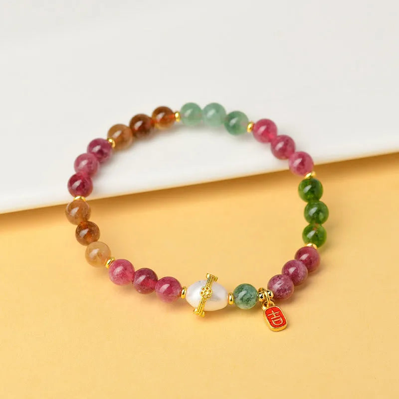 Chalcedony and tourmaline unisex crystal bracelet with 6.5mm geometry beads in colour Z054.