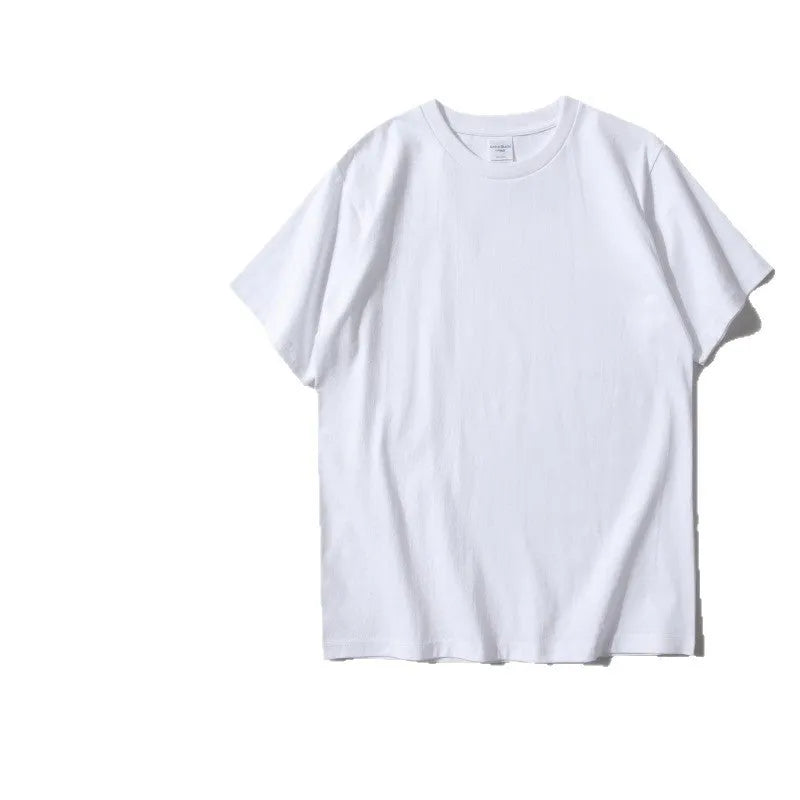 Man wearing a heavy cotton loose-fit T-shirt in navy blue, showing short sleeves and casual style.
