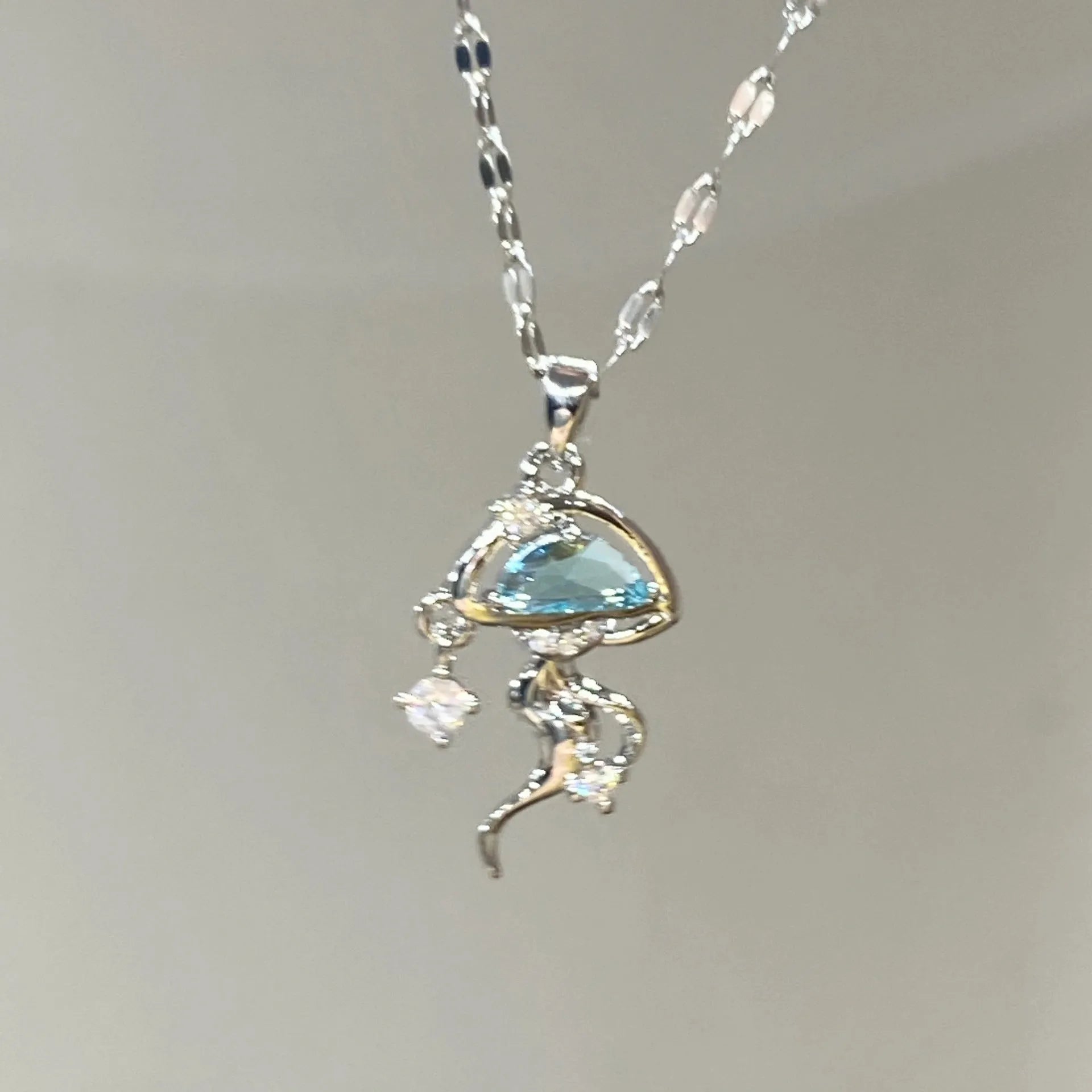 Sterling silver blue jellyfish necklace with white gold plating and adjustable chain