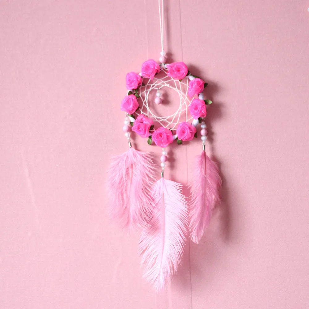 Pink ostrich feather dreamcatcher wind chime measuring 10cm for wall decoration