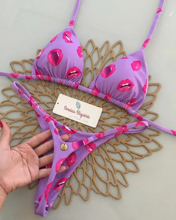 Women's printed lace-up split bikini set in nylon, available in six prints and sizes S, M, L.