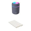 Pink USB desktop humidifier with 300ml water tank and colourful LED lights on wooden desk