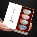 Four ceramic tea cups in a light colour finish arranged in a gift box, new Chinese style design