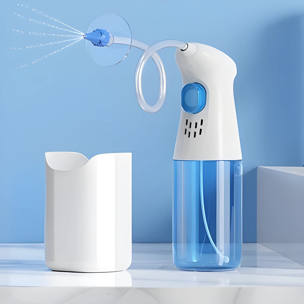 E20 Blue portable manual ear wash tool with water basin, one-hole nozzles and five-hole nozzle on host