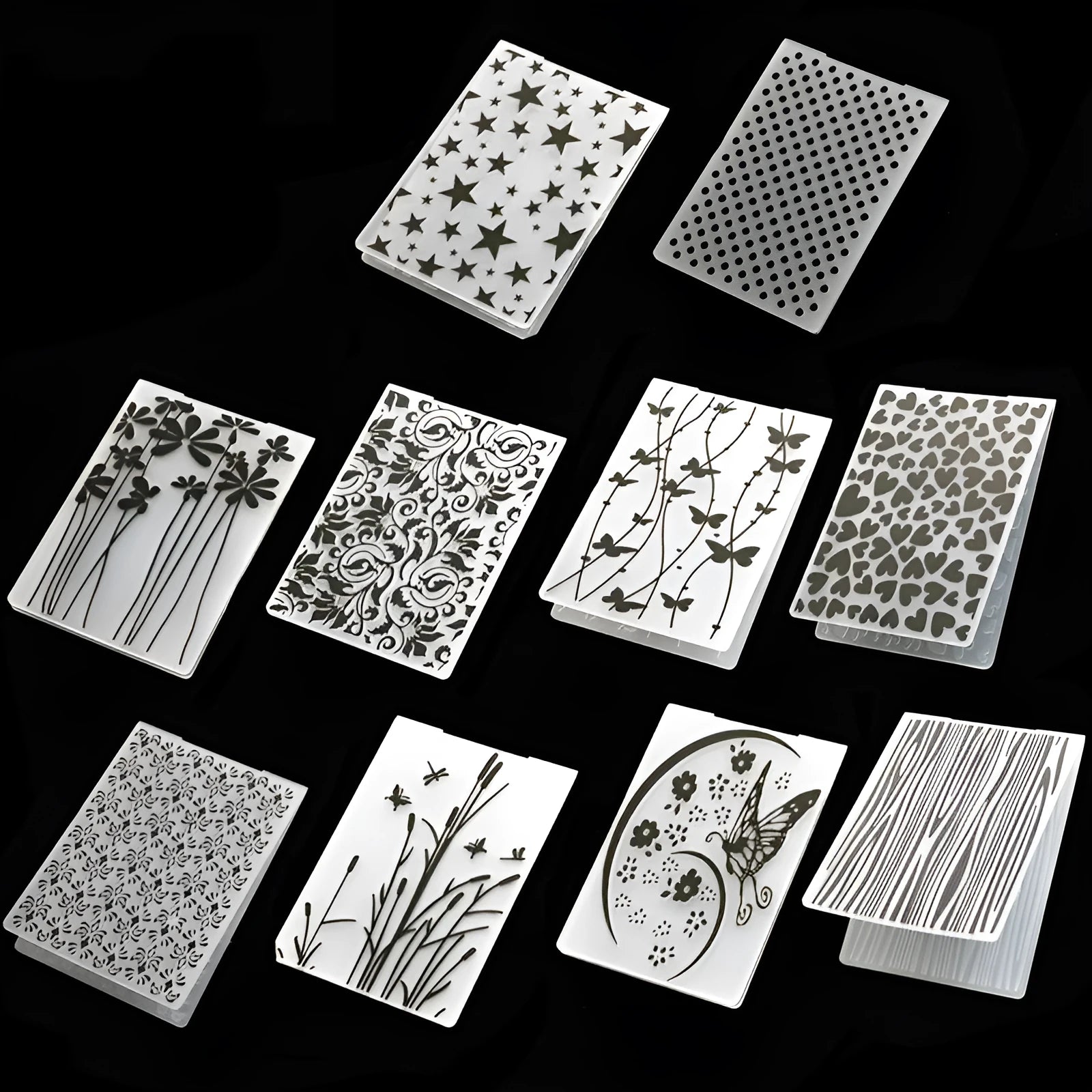Plastic cake decorative mould set showing windmill, star and butterfly shapes for sugar craft
