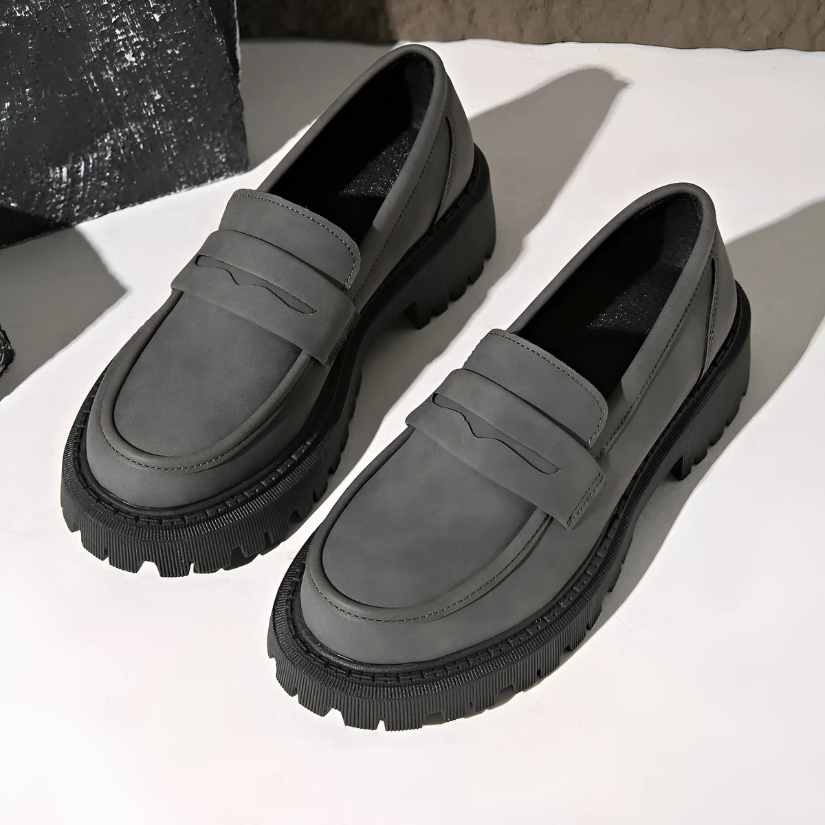 Grey low heel slip-on loafers with metal thick heel and waterproof platform, mid heel 3-5cm, side view