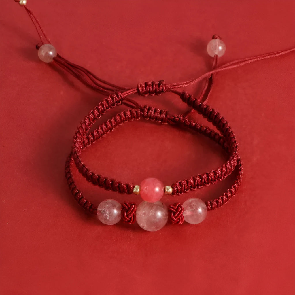 Woven red rope bracelet with strawberry quartz beads and alloy clasp