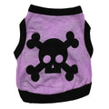 Blue Halloween dog vest with skull bones pattern on a small dog