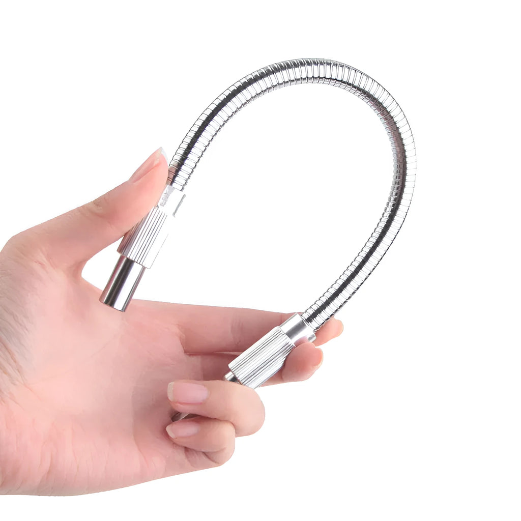 Silver metal flexible shaft for cordless drill with 6.35mm shank, shown coiled to demonstrate flexibility.