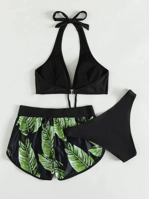 Stylish leaf print bikini with shorts in a variety of vibrant colors, perfect for summer beach or pool wear.