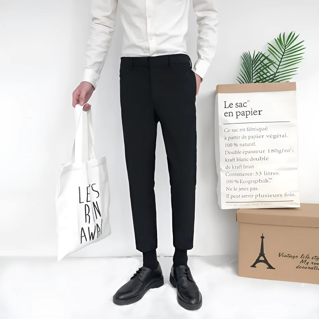 Men's straight-leg cotton trousers with drawstring waist in black, available in sizes 28-34