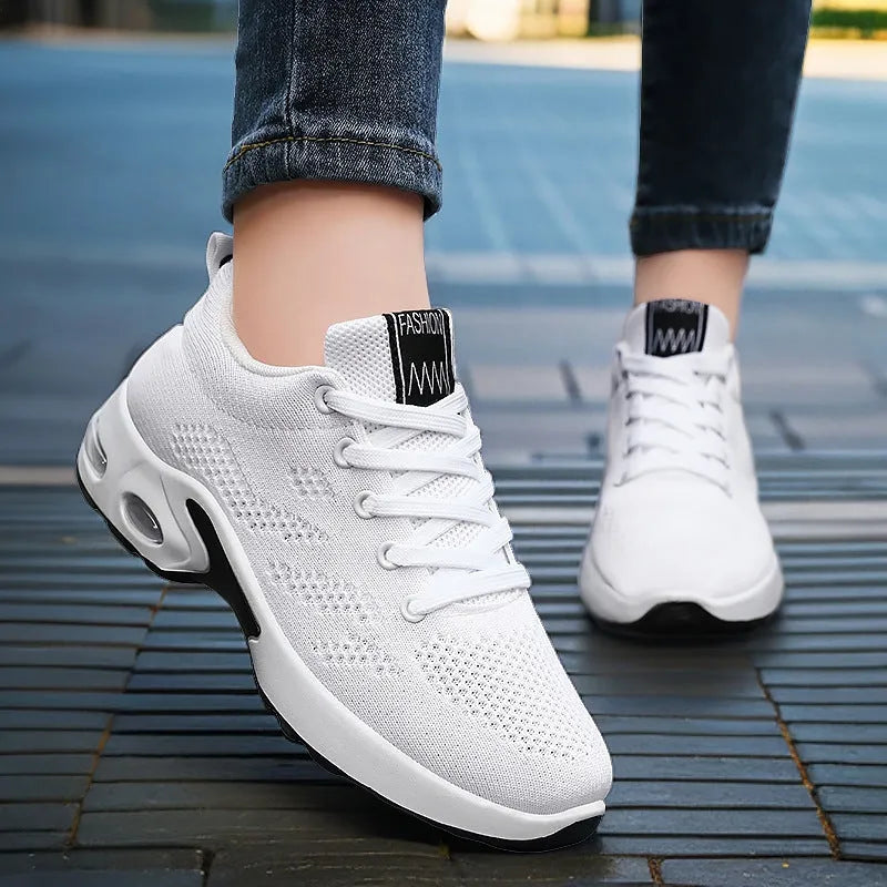 Breathable soft sole women's sneakers in 814 black with mesh lining, PVC sole, low heel, and round toe design