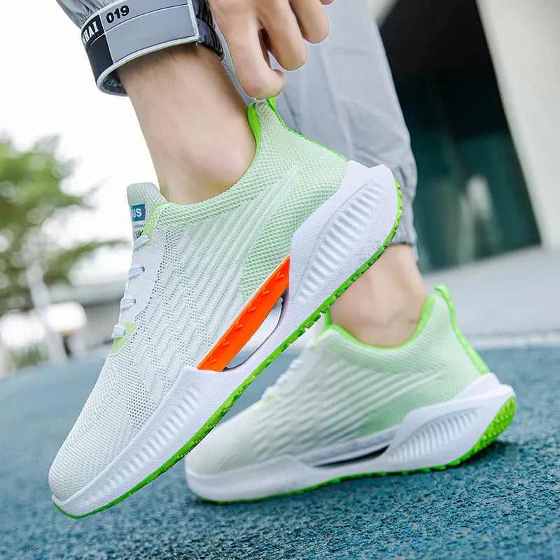 Men's blue casual sports mesh shoes with cloth upper and round toe design on a white background.