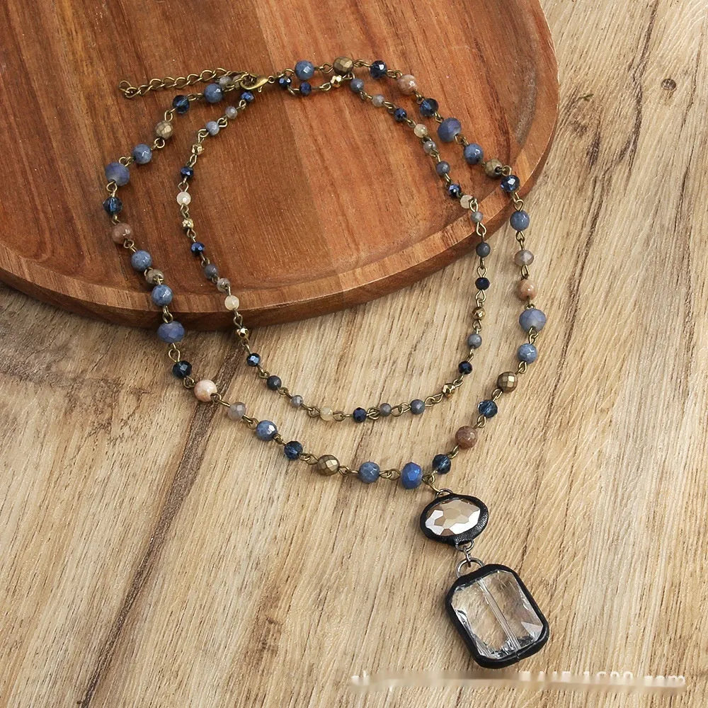 Tribal style necklace with glass stone pendant on two-layer adjustable chain