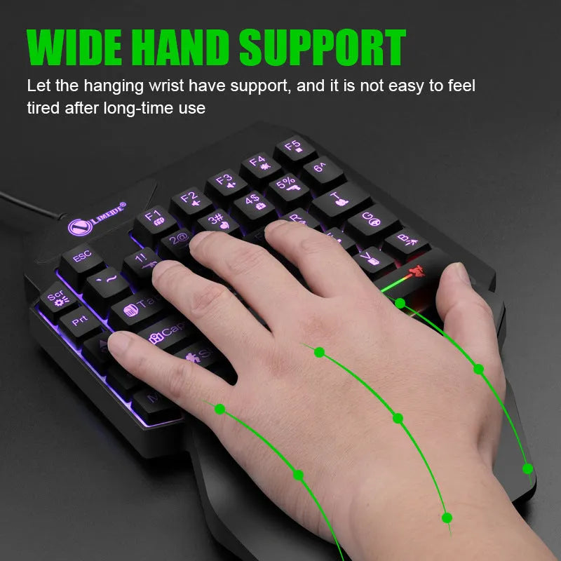 GK103S one-handed luminous gaming mechanical keyboard with mouse converter on a desk.