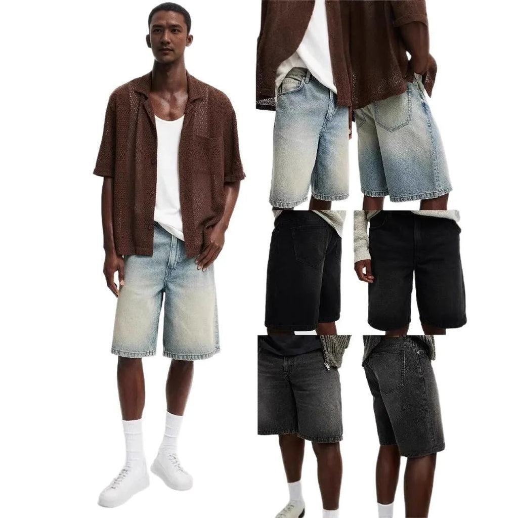 Men's loose straight-leg cotton jeans in light blue, black, and grey colours on a plain background.
