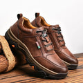 Men's British style round toe leather shoes in black or brown with rubber sole, leather stitching, and front lace-up
