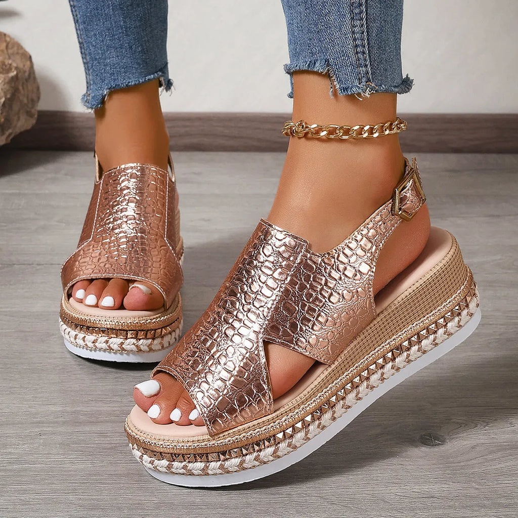 Gold women's Roman sandals with round toe, openwork design and ankle buckle strap