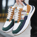 Men's mesh casual sports shoes in white green, black, and grey colours with shallow cut design