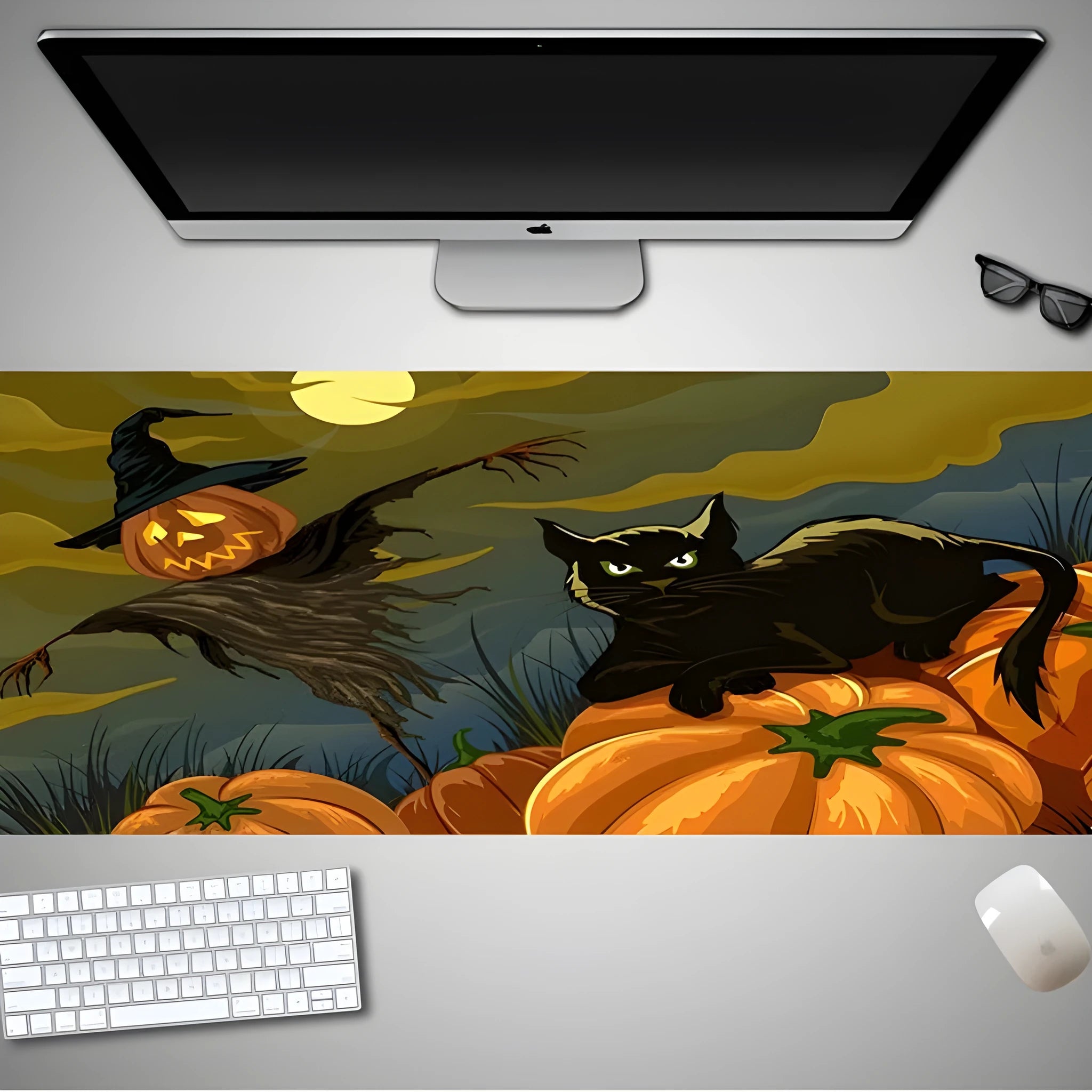 Oversized Halloween gaming mouse pad with non-slip rubber base on a desk
