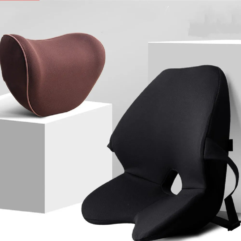 Car seat cushion with integrated memory foam waist pad and optional attached headrest in a neutral colour.