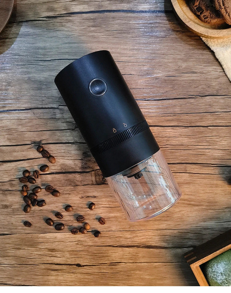 Portable USB-C powered electric coffee grinder with adjustable ceramic burr mechanism for freshly ground coffee