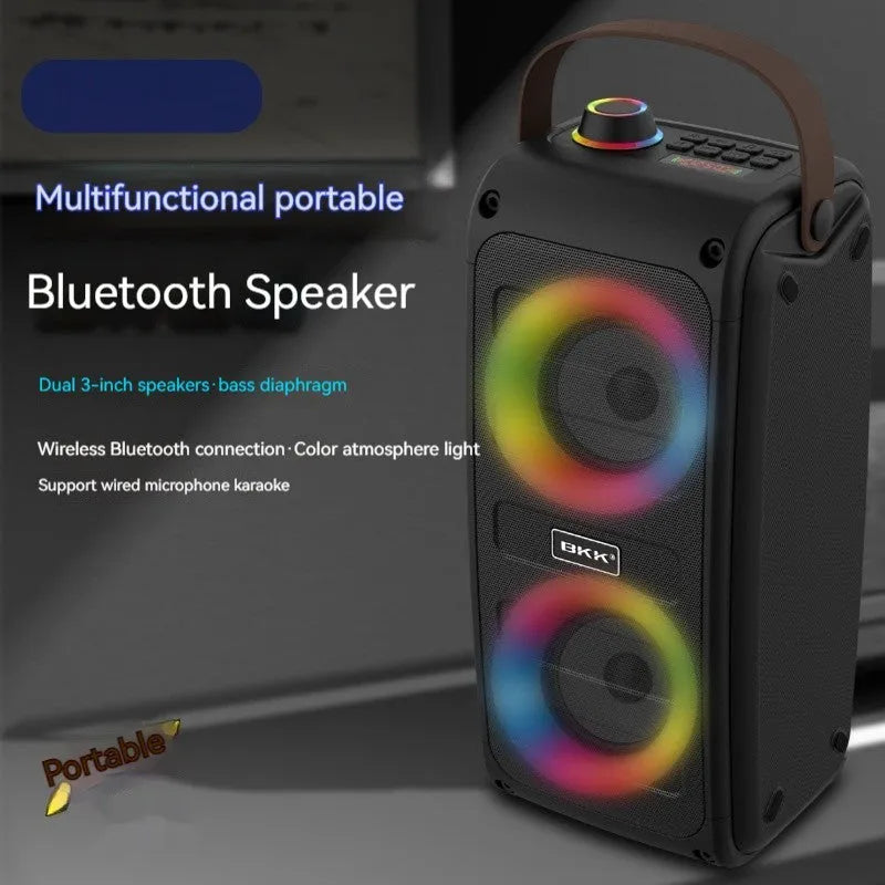Portable Bluetooth speaker with colour light in black plastic shell, showing built-in speaker grille and button controls.