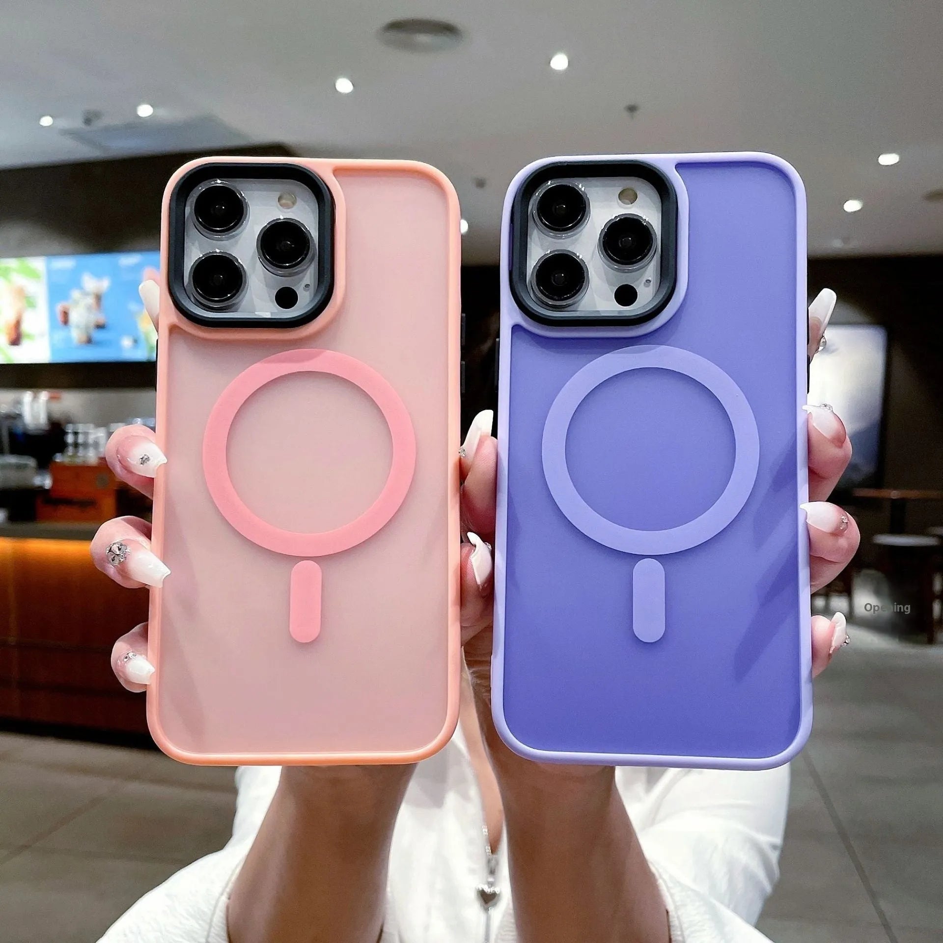 Frosted magnetic hard phone case for Apple iPhone 16 in various colours on a table.