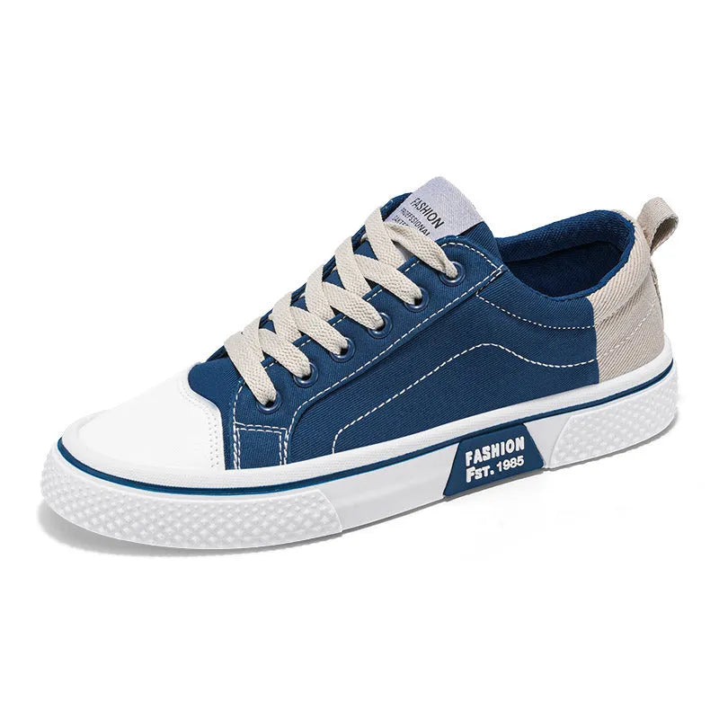 Men's low-top casual canvas shoes in blue colour with round toe and front lace-up design