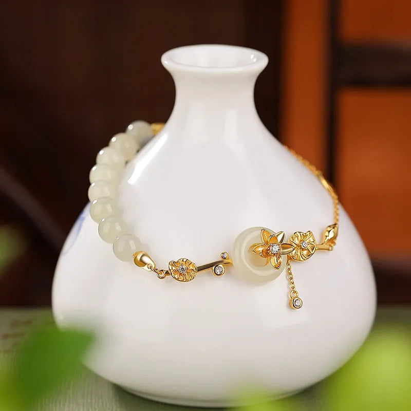 Women's antique silver bracelet with peace buckle clasp and inlaid Hetian jade lotus charm