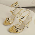 Women's black buckle cross-strap stiletto heel sandals with open toe design