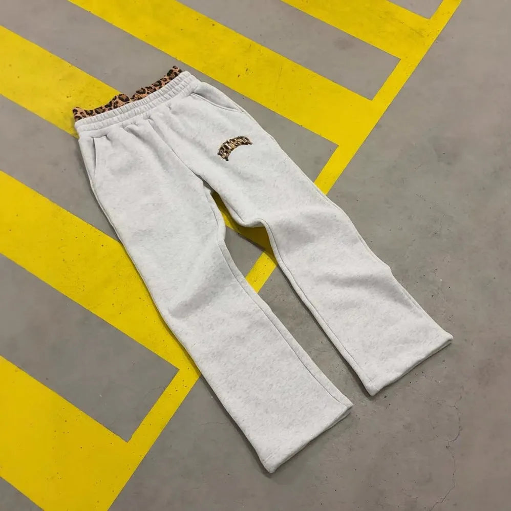 Men's loose fit hip hop trousers with double waist patchwork design and zip fly in elastic polyester fabric