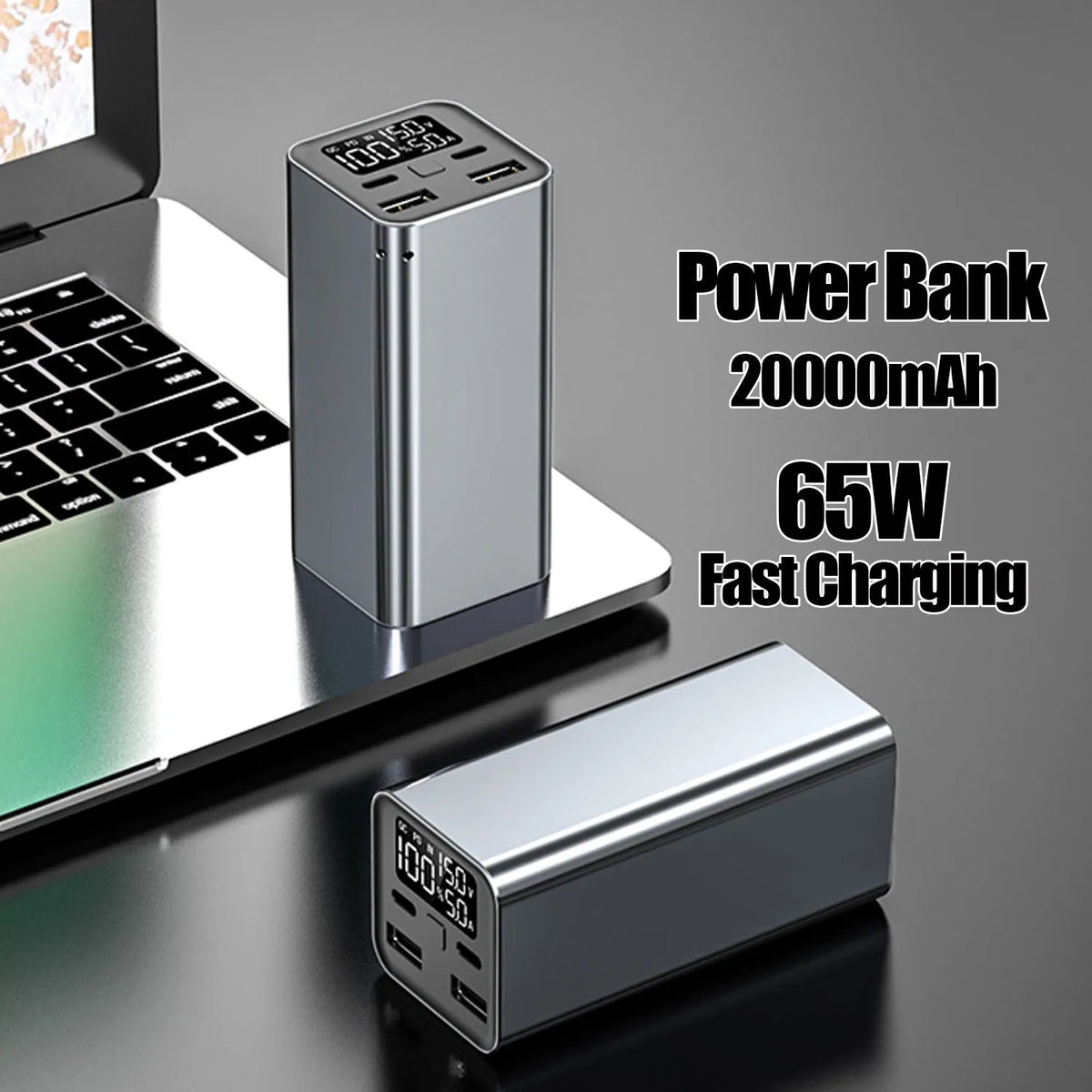 65W metal laptop power bank in black, blue, or grey colours showing size next to a laptop.