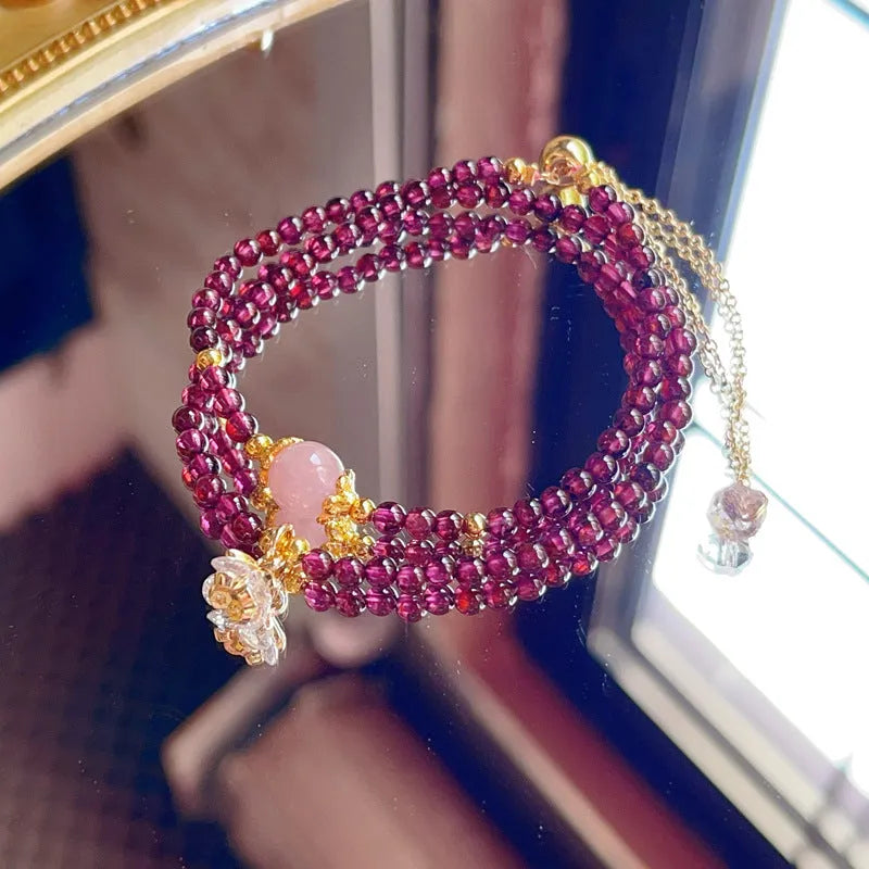 Women's natural garnet bracelet with double ring design in H311 colour, handcrafted using manual processing techniques